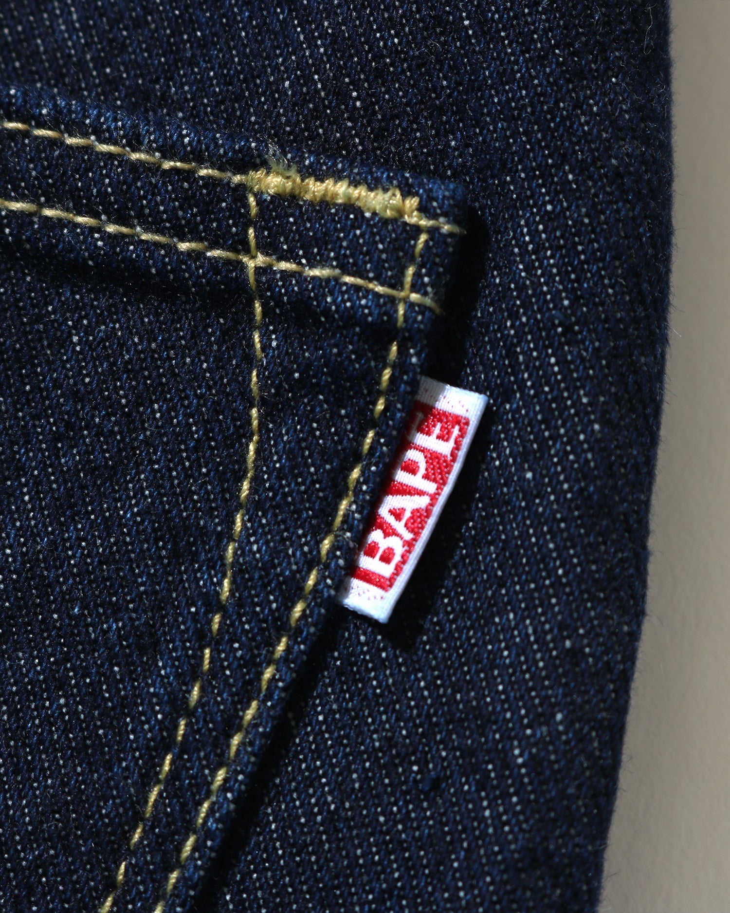 A BATHING APE® BAPE Logo Tapered Denim Jeans | Bape official