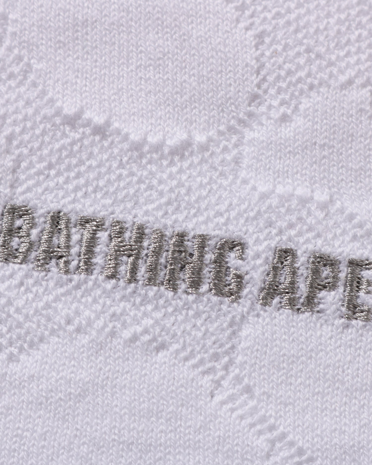 A BATHING APE® Solid Camo Jacquard Relax Fit Polo Shirt | Bape
