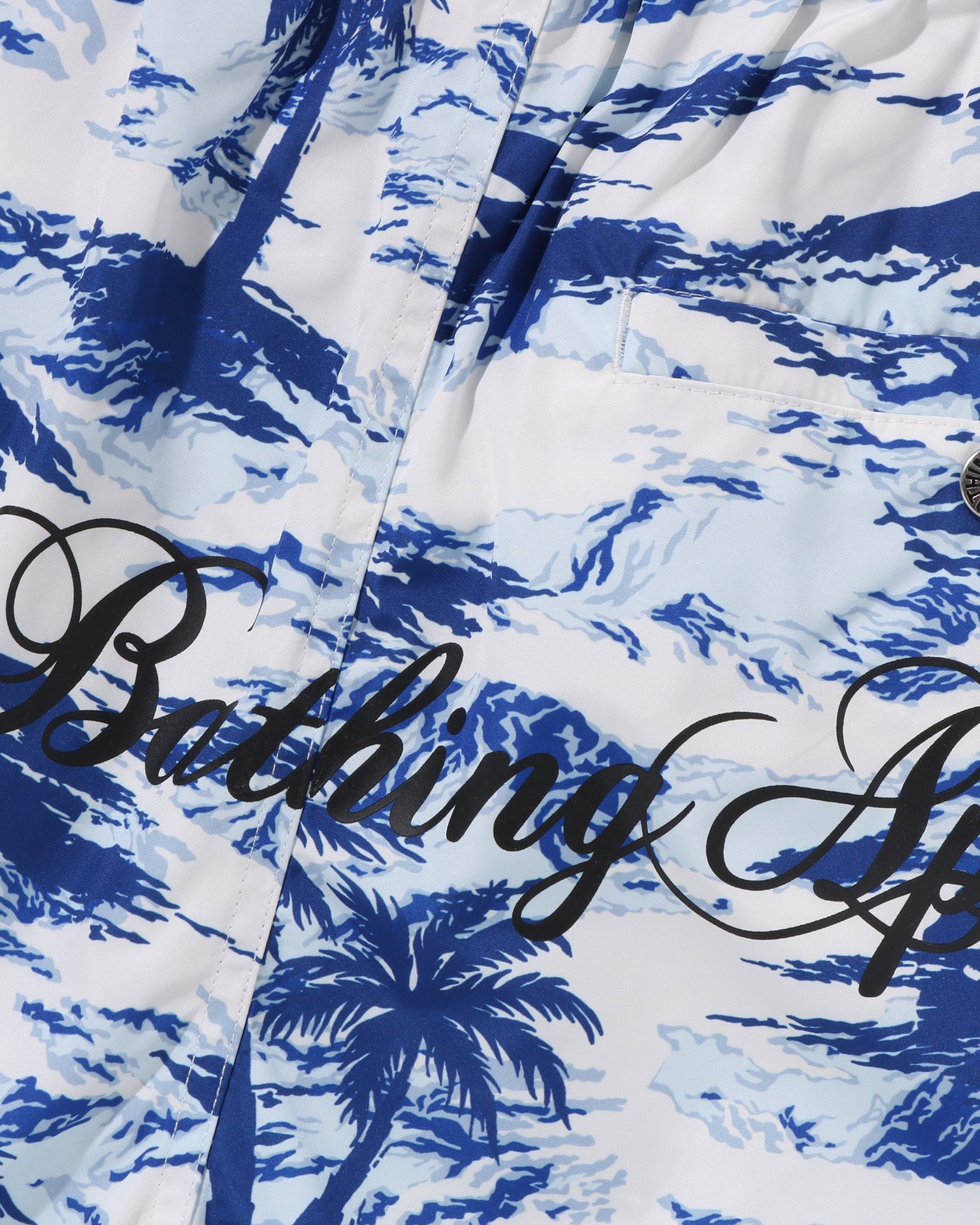 A BATHING APE® Palm Tree Camo Relaxed Fit Beach Shorts | Bape